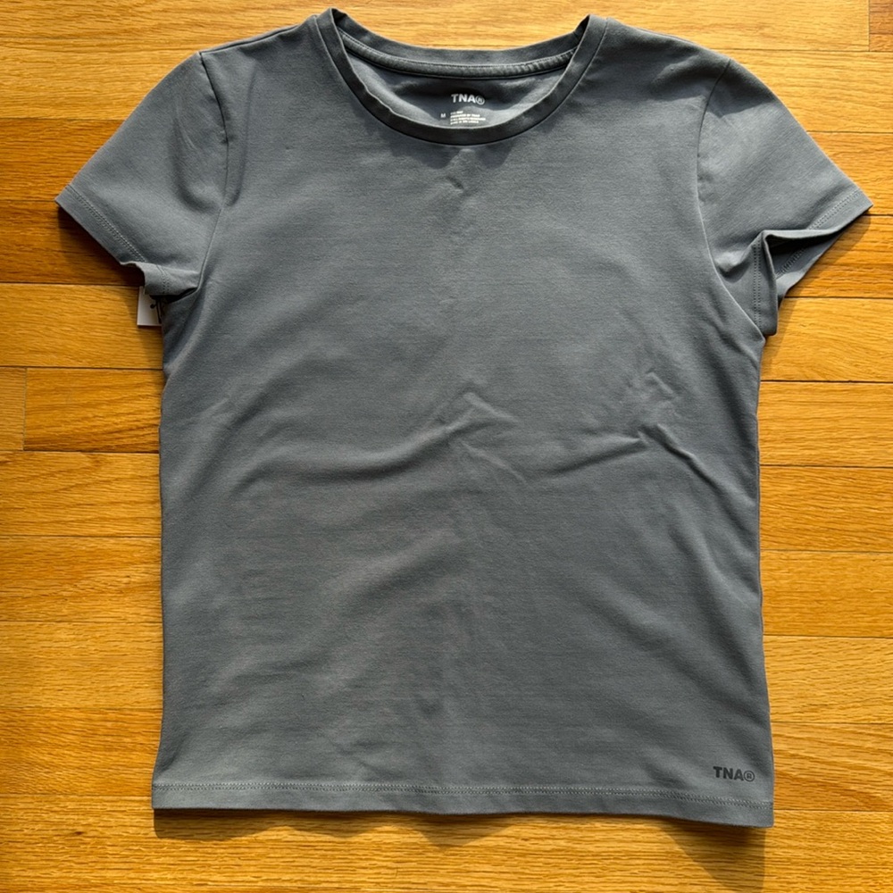 Aritzia TNA hold-it ortiz tee in shady blue. Size medium.